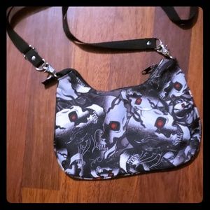 A skull cross body bag